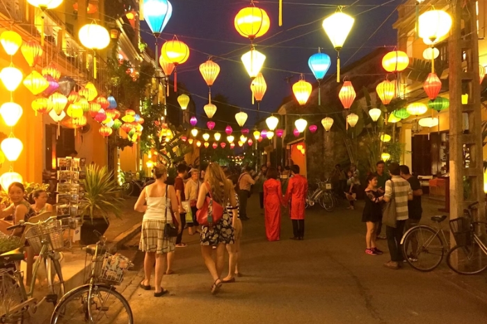 Take a walk along the riverbank in a colorful evening